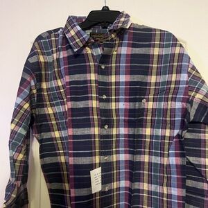 Large Eddie Bauer button on collared